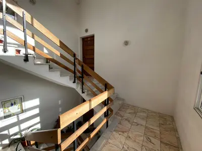 a staircase in a room with white walls at Santa Luzia Apartment in Funchal
