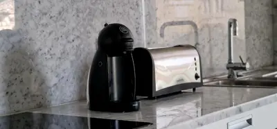 a coffee maker sitting on top of a kitchen counter at Upscales by LovelyStay - private parking in Funchal