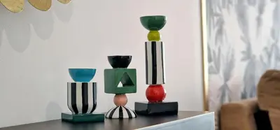 three vases sitting on top of a table at Upscales by LovelyStay - private parking in Funchal