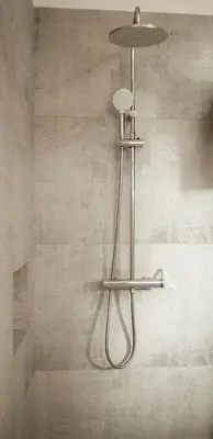 a shower in a bathroom with a shower head at Slowing Villas - Villa Oceano in Porto Santo