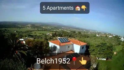 a house with solar panels on the roof at Belchior Apartment - Belch1952 in Lagos
