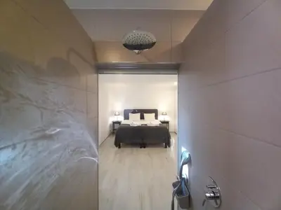 a bedroom with a bed in a room at Belchior Apartment - Belch1952 in Lagos