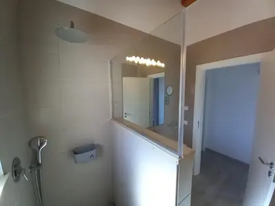 a bathroom with a sink and a mirror at Carlos Apartment - Penthouse - Belch1952 in Lagos