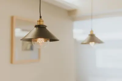two lights hanging from a ceiling in a room at Alto Lido by Madeira Best Apartments in Funchal