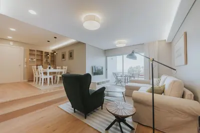 a living room with a couch and a table at Alto Lido by Madeira Best Apartments in Funchal