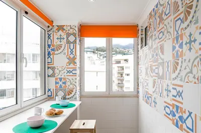 a small bathroom with blue and white tiles at Quinta Deão I by An Island Apart in Funchal