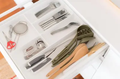 a drawer full of kitchen utensils in a drawer at Apartamentos Praça Amarela by Heart of Funchal in Funchal