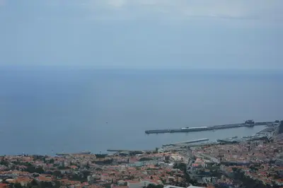 an aerial view of a city with a bridge in the water at Sea and Sun 4 You - Choupana Studio in Funchal