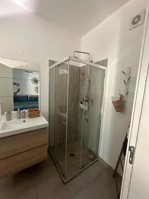 a bathroom with a shower and a sink at DuMar Beachouse in Salema