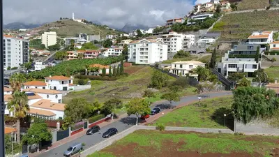 an aerial view of a city with buildings at PERFECT DUPLEX PISCINE Zone VIP Funchal in Funchal