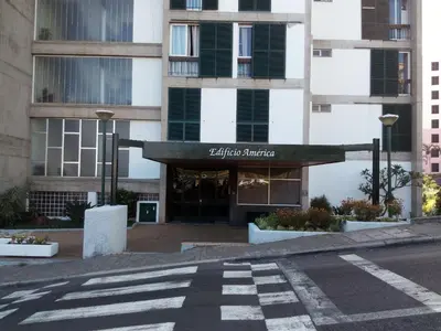 an empty street in front of a building at Apartamentos América - Blue Sea II in Funchal