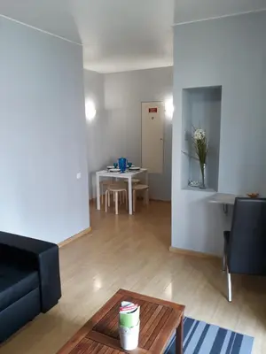 a living room with a couch and a table at Apartamentos América - Blue Sea II in Funchal