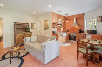 a living room with a couch and a table at Casas do Lanço by An Island Apart in São Vicente