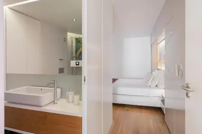 a bathroom with a sink and a mirror at Baía I by An Island Apart in Funchal