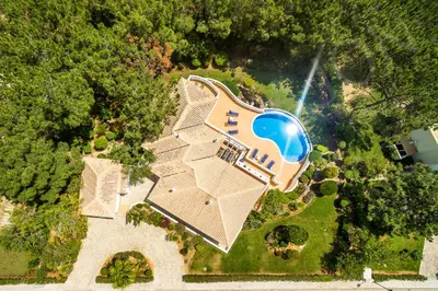 an aerial view of a house with a swimming pool at Casa Clajon in Budens