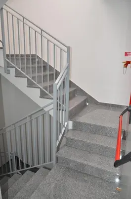a staircase in a building with a metal railing at Edificio Charles 102 in Funchal