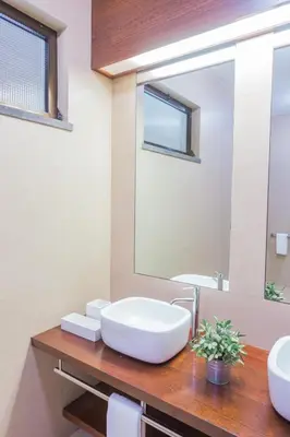 a bathroom with a sink and a mirror at FLH Luxury Villa Mar with Private Sea Access in Caniçal
