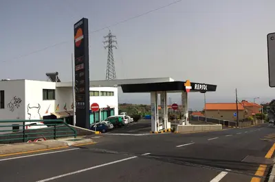 a gas station on the side of a road at Villas Quinta da Lapa by AnaLodges in Câmara de Lobos