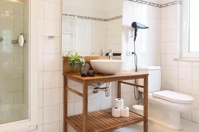 a bathroom with a sink and a toilet at Marécasa in Aljezur
