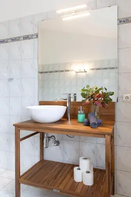 a bathroom with a sink and a mirror at Marécasa in Aljezur