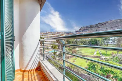 a balcony with a view of a city at Pérola - Madeira Inn Group in Funchal