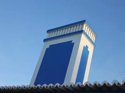 a building on top of a roof at Monte de Santo Antonio - Turismo Rural in Vila do Bispo