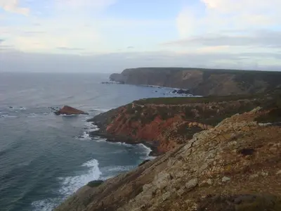 an aerial view of the ocean and a rocky coast at Monte de Santo Antonio - Turismo Rural in Vila do Bispo