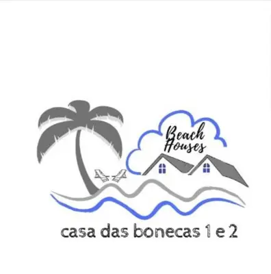 a logo for a beach resort with a palm tree and waves at Casa das bonecas 2 # Private Garage Included # in Paul do Mar