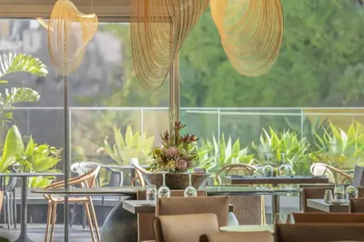 a lobby with a sign that says dessert on the wall at The Views Baia - Adults Only in Funchal