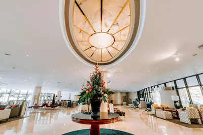 a lobby with a large clock on the ceiling at Enotel Lido - All Inclusive in Funchal