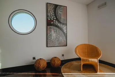 a hallway with a staircase and a window in a building at Quinta Mirabela - Design Hotel in Funchal