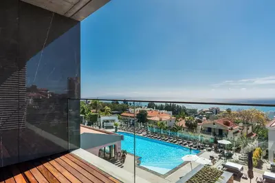 a view of the pool from the balcony of a hotel at TUI Blue Gardens - Adults-only - Savoy Signature in Funchal