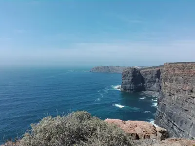 a view of the ocean from a cliff at Arrifana Summer Flat in Aljezur