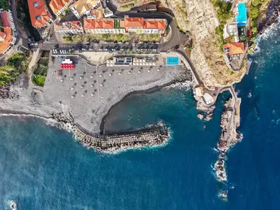 an aerial view of a resort next to the ocean at Sunny Ponta 