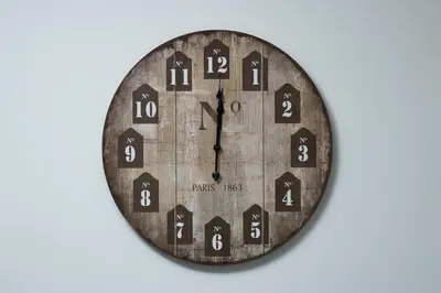 a clock with numbers on it on a white background at ANGEL´S SUNSET in Estreito da Calheta