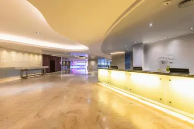 a large room with a bar in a building at Pestana Casino Park Hotel & Casino in Funchal