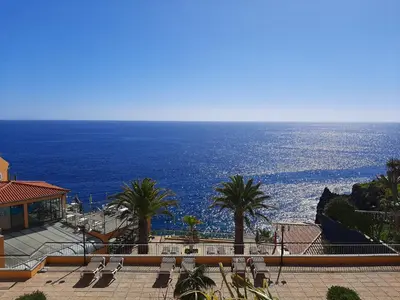 a view of the ocean from a resort at Hotel Cais da Oliveira in Caniço