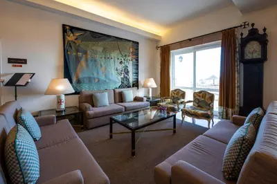a living room with a couch and a table at Pousada de Sagres in Sagres