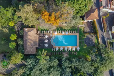 an aerial view of a mansion with a swimming pool at Quinta da Bela Vista in Funchal
