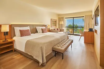 an aerial view of the resort with the ocean in the background at Hotel Porto Mare - PortoBay in Funchal