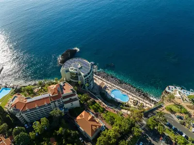 an aerial view of a resort near the ocean at Pestana Vila Lido Madeira Ocean Hotel in Funchal