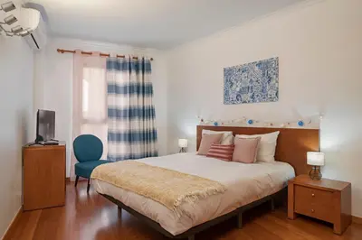 a living room with two beds and a couch at Apartamento Lobo Marinho by An Island Apart in Santa Cruz