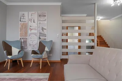 a living room with a couch and two chairs at Charming Villa in Funchal in Funchal