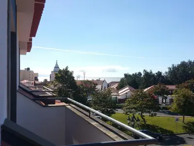 a view of a city from a balcony at Santa Cruz Village Hotel in Santa Cruz