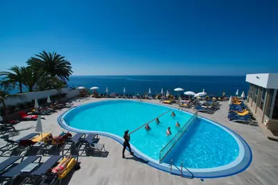 an overhead view of a swimming pool at a resort at Duas Torres Hotel in Funchal
