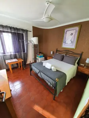 a bedroom with a large bed in a room at Ocean View Lagos in Lagos