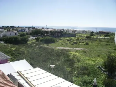 a view of the ocean from the roof of a house at Ocean View Lagos in Lagos