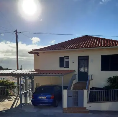 a car parked in front of a house at Villa SCIROCCO Madeira - Ocean View in Machico