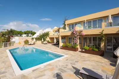 an image of a house with a swimming pool at Vila Luz in Luz