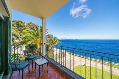 a balcony with a view of the ocean at Albatroz Beach & Yacht Club in Santa Cruz